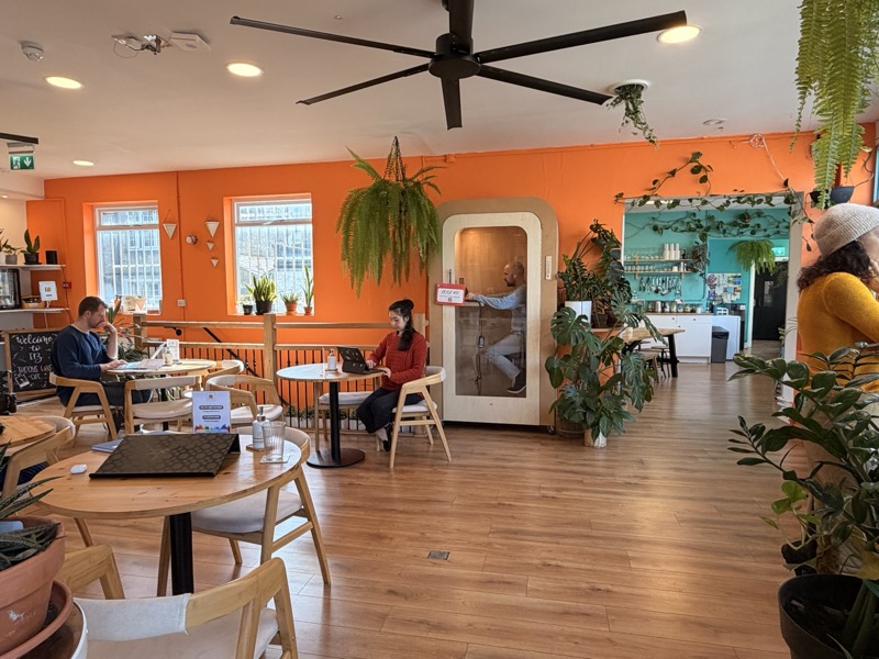 The lounge and phone booth at Impact Brixton